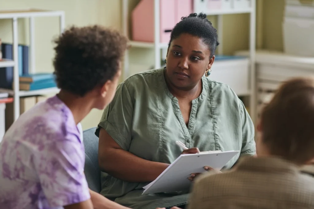 Counsellor talking with children